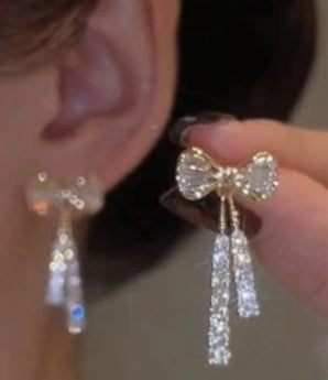 Bow earrings with rhinestones