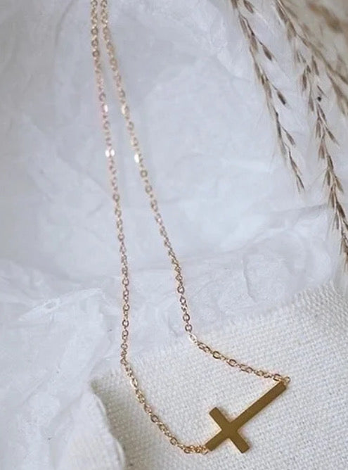 Woman’s small cross