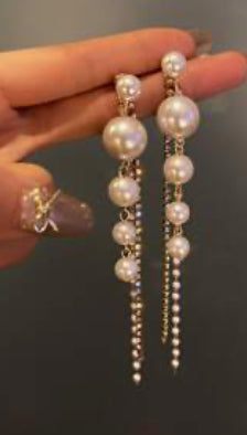 Long pearl earrings
