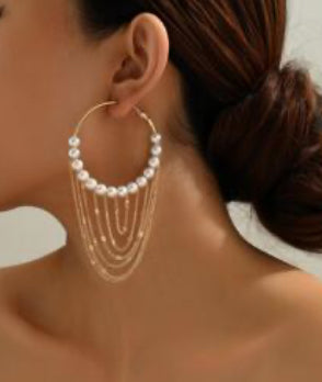 Long round pearl earrings