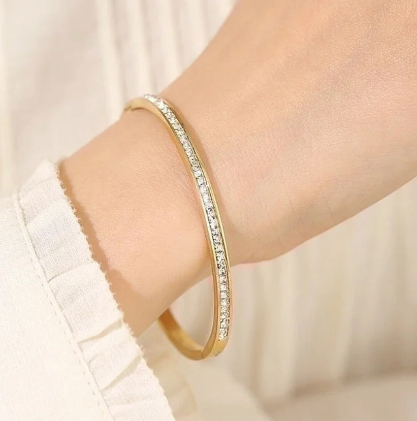 Gold and rhinestone bracelet