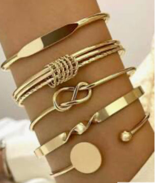 Set of 5 gold bracelets
