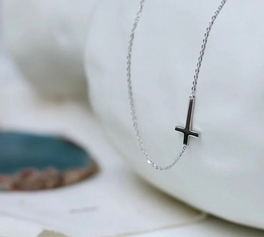 Woman’s small cross