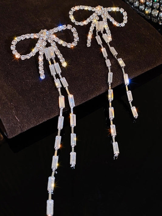 Long bow earrings