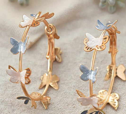 White and blue butterfly earrings