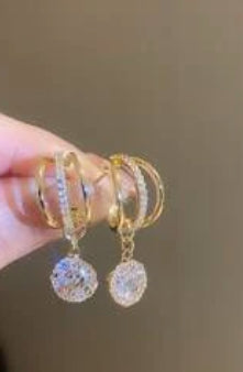 Small gold dangling earrings
