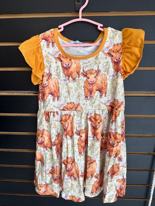 Orange cow ruffle dress