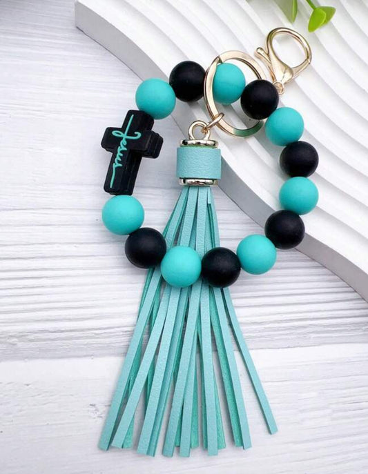 Teal blue and black Jesus tassel keychain