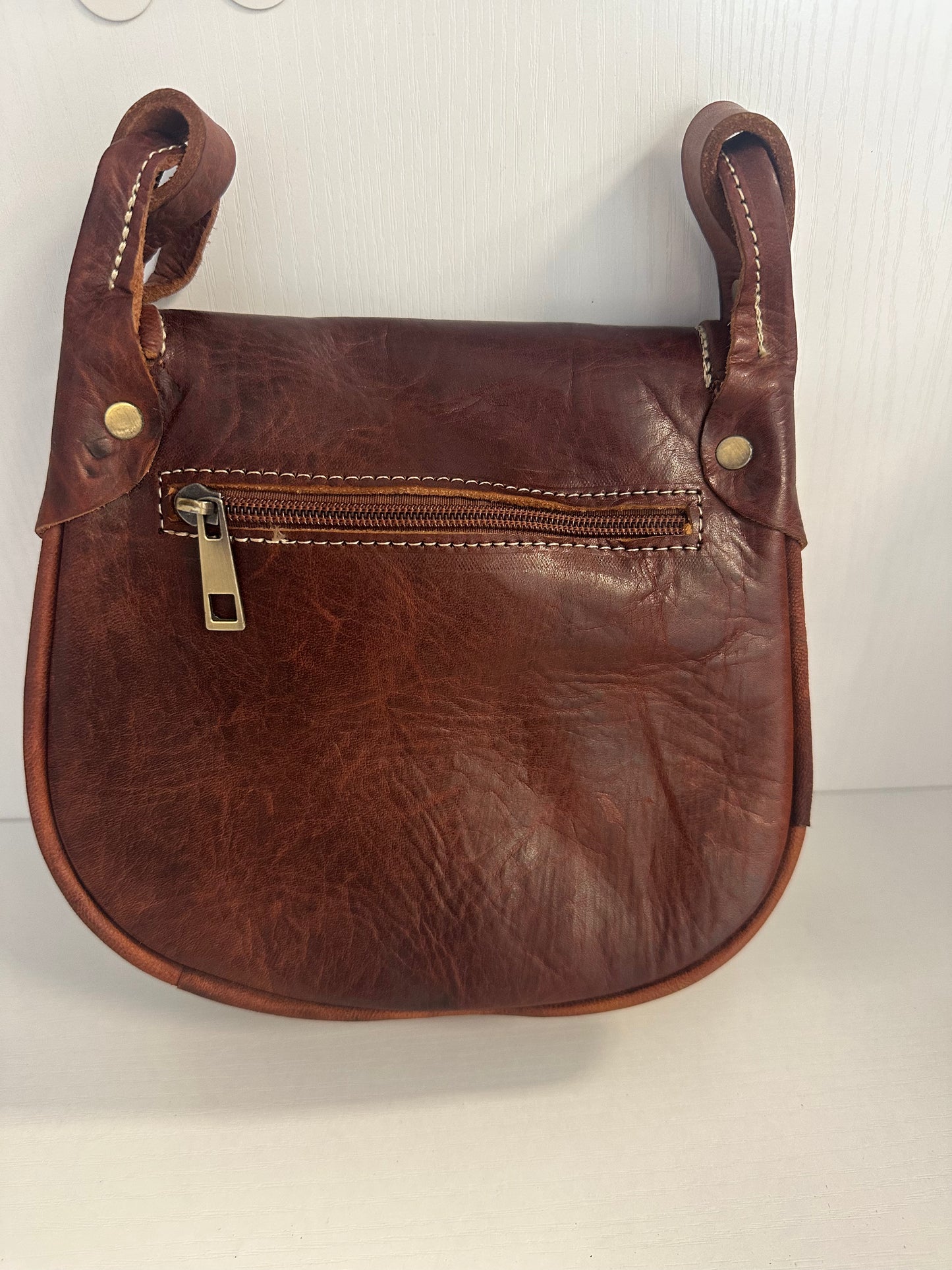 Small Zella leather crossbody with distinct touches
