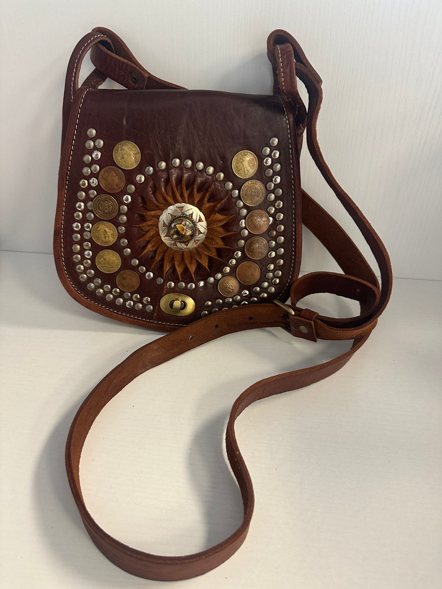 Small Zella leather crossbody with distinct touches
