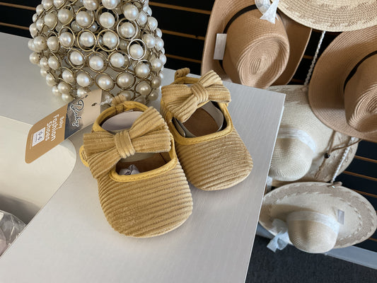 Mustard color baby shoes