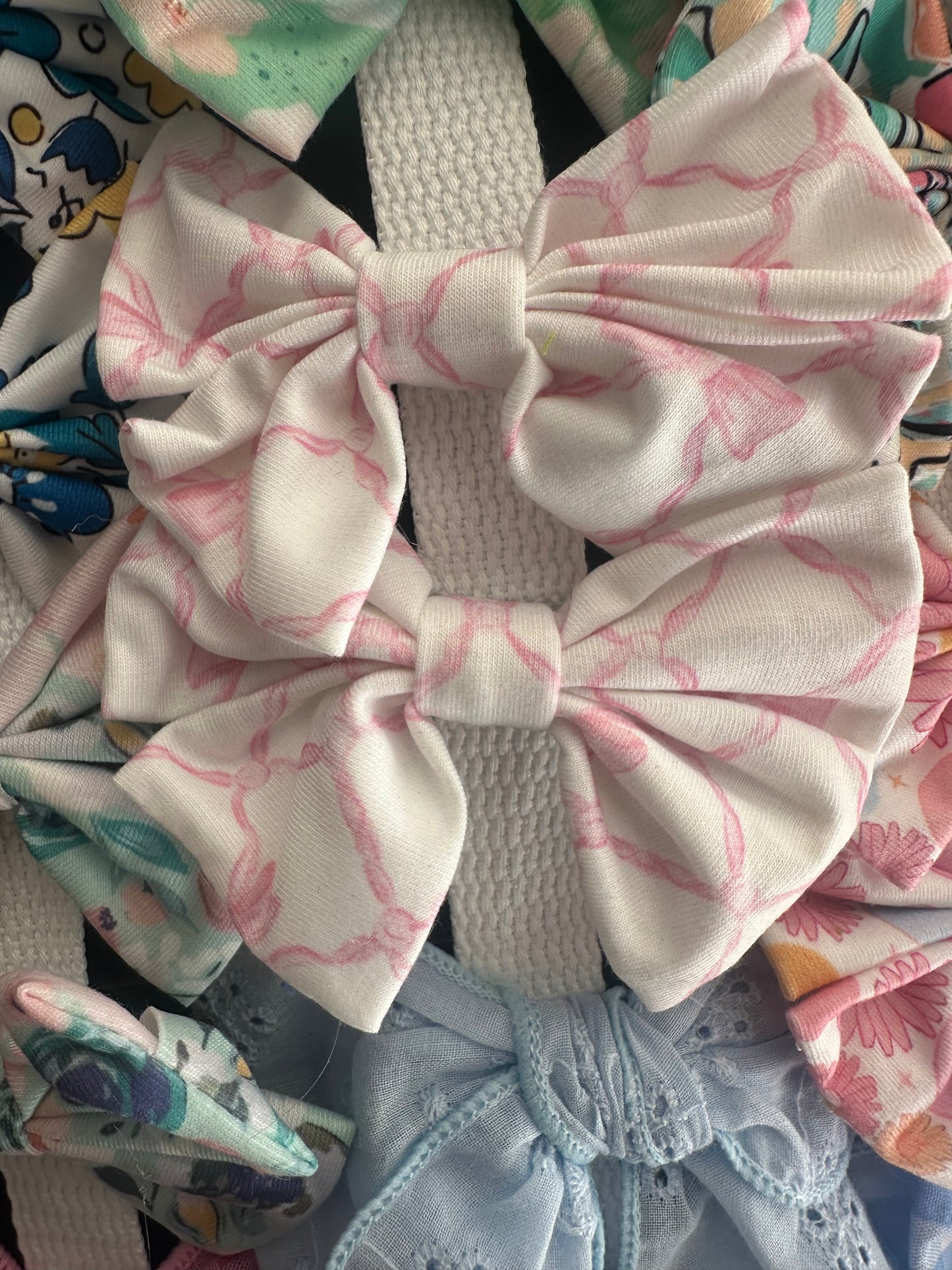 White and pink small bows