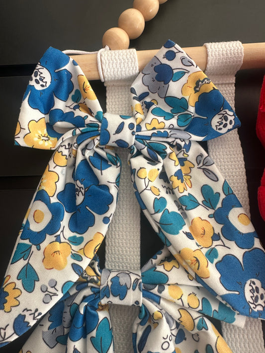 Large floral blue bows